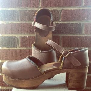 Brown leather clogs